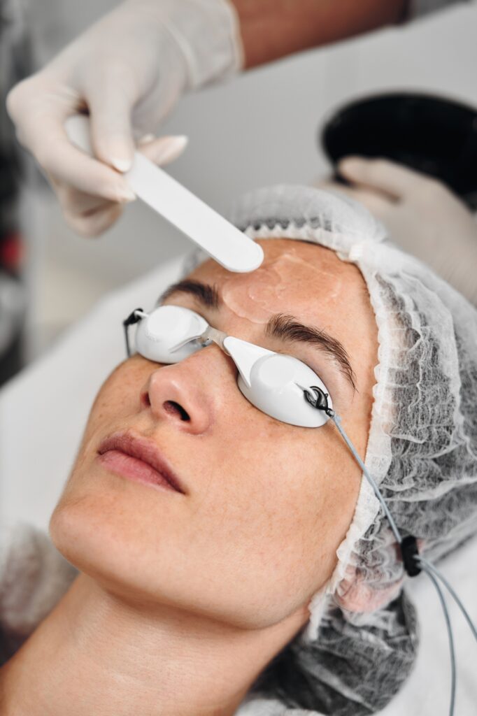 A woman receives IPL therapy in a beauty salon.